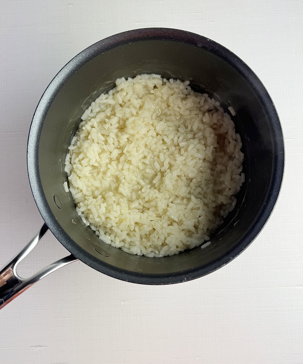 Cooked arborio rice in a pot.