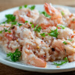 Easy coconut shrimp risotto on a plate.