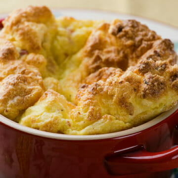 Easy ham and cheese souffle in a casserole dish.