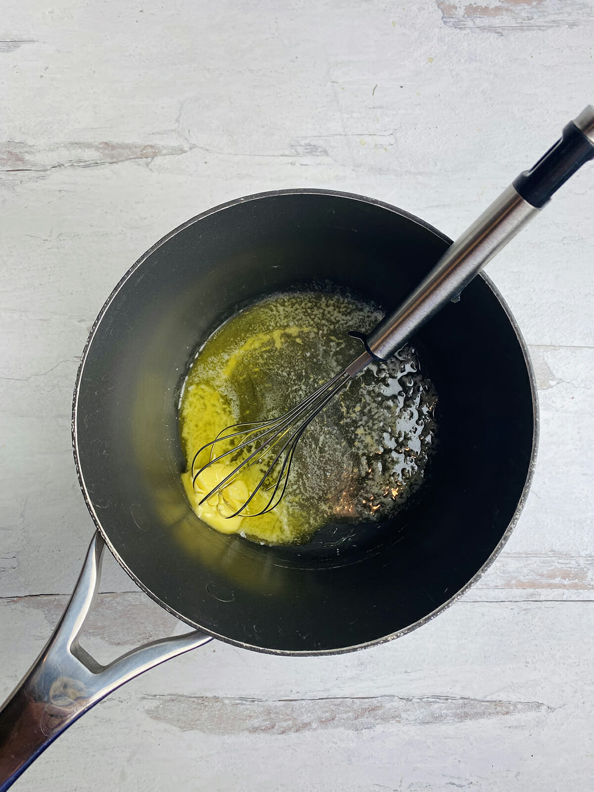 Melted butter in a skillet.