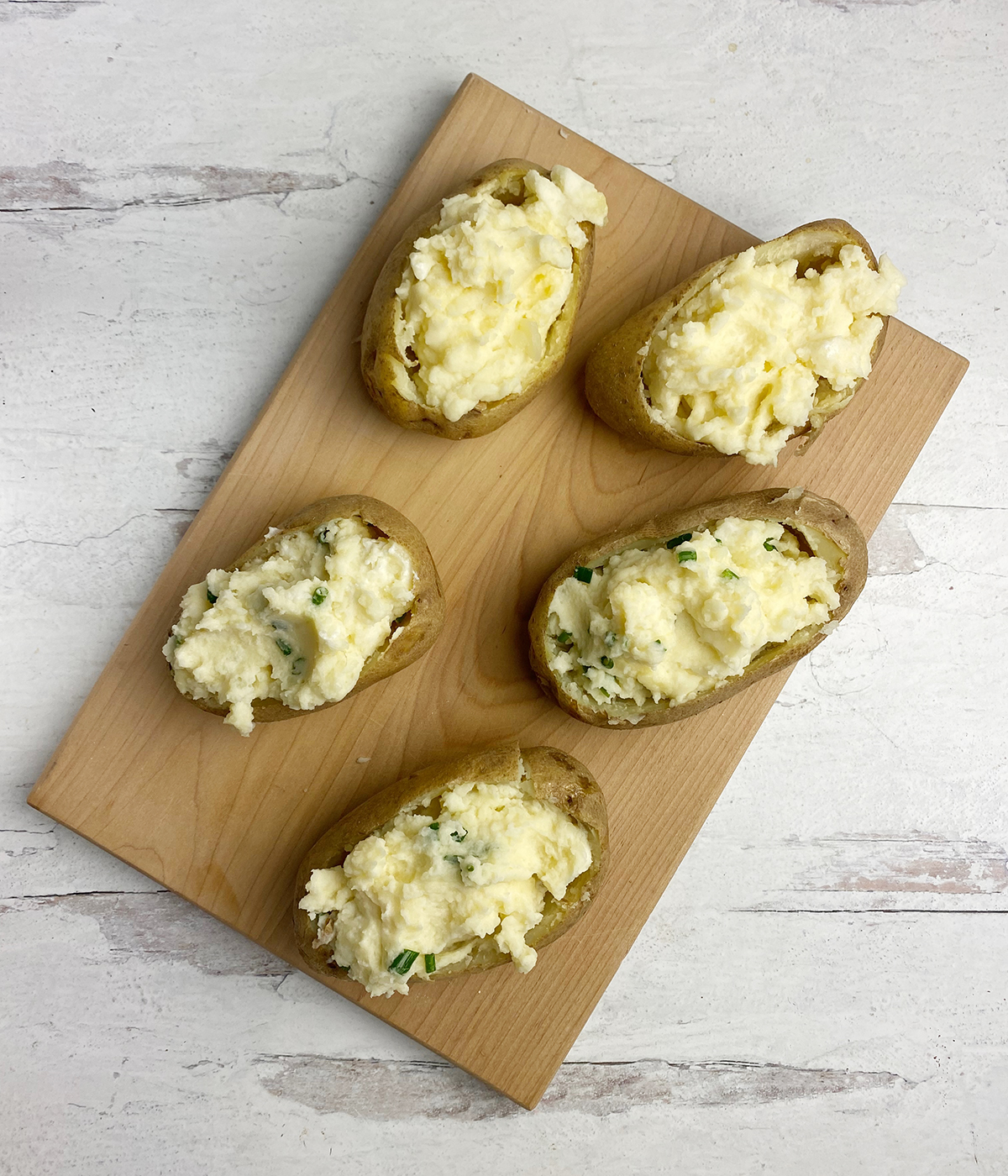 Baked stuffed potatoes ready for baking.