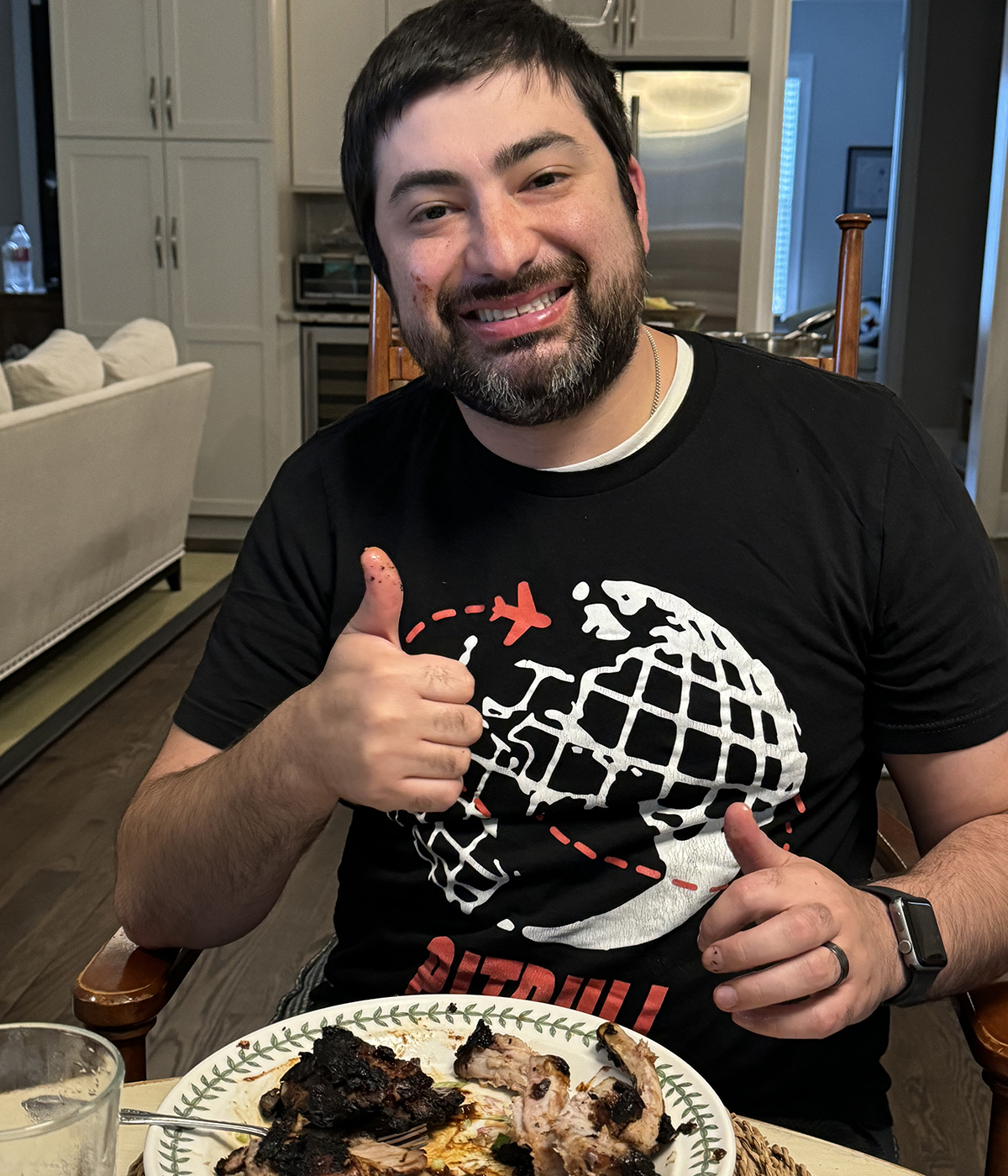 Happy guy eating Coca Cola Ribs.