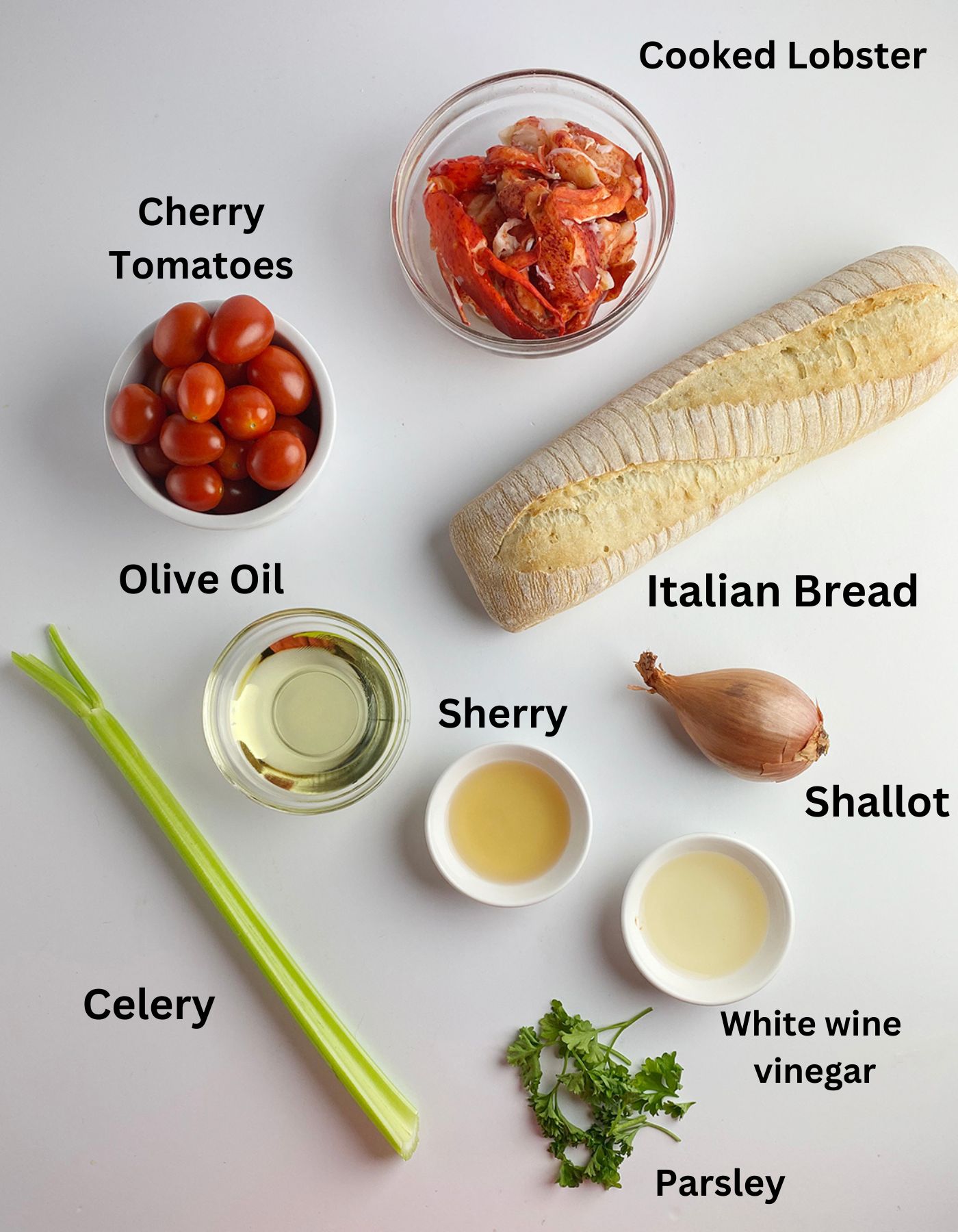 Ingredients for lobster bruschetta on a counter.