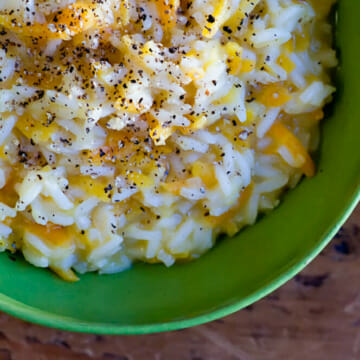 Easy carrot parmesan risotto in a bowl.