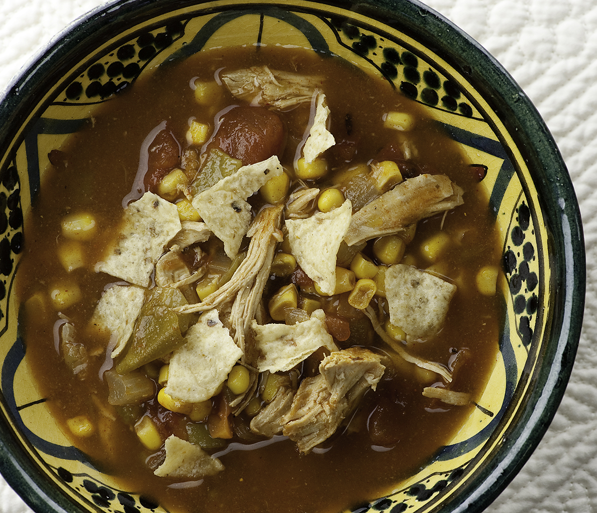 Chicken tortilla soup in a bowl.