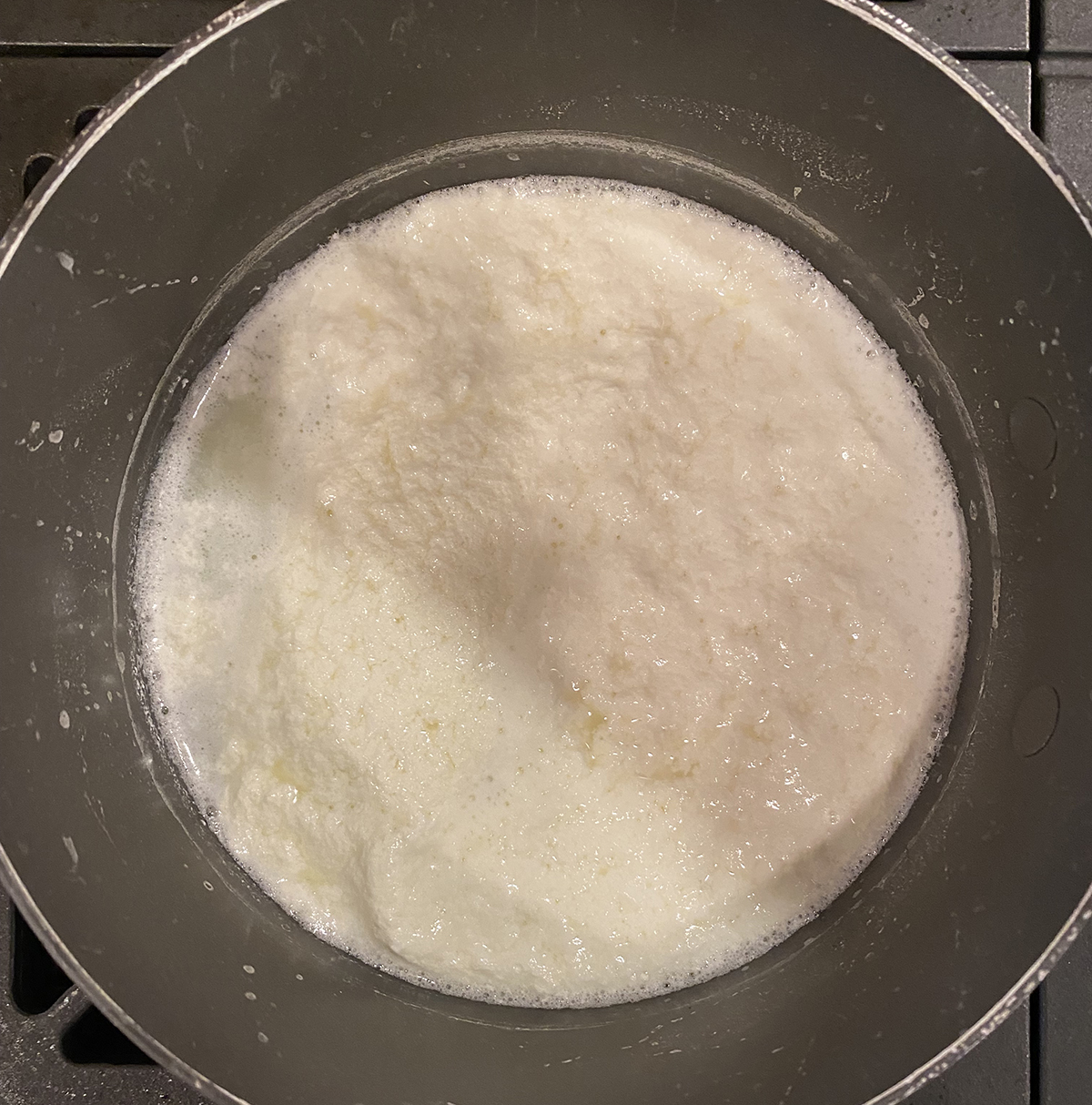 fresh ricotta thickening in pot