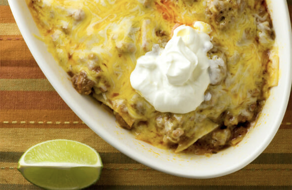 Beef Enchilada Casserole on a placemat.