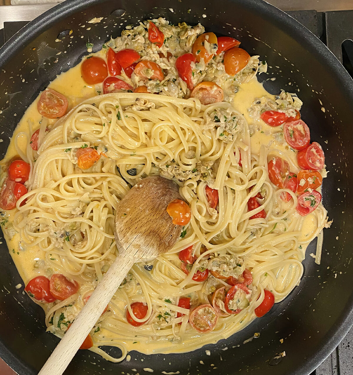 Linguine with clam sauce in skillet.