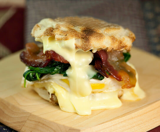 egg sandwich with Brie, spinach and maple bacon