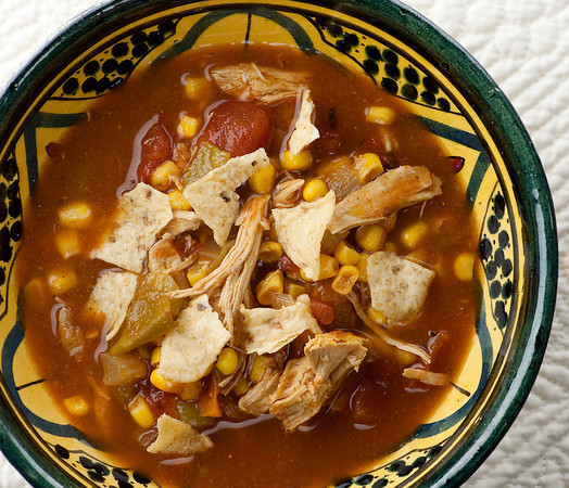 Slow cooker chicken tortilla soup in a bowl.