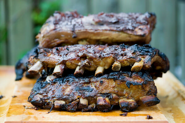 Grandpa's Coca-Cola Ribs sitting on a cutting board.