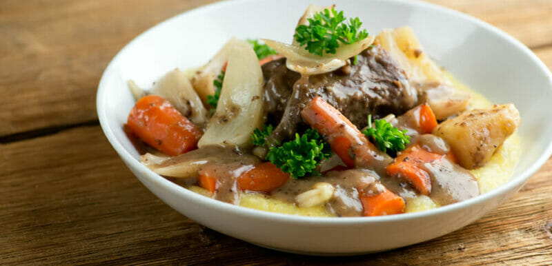 show cooker short ribs with carrots and apples
