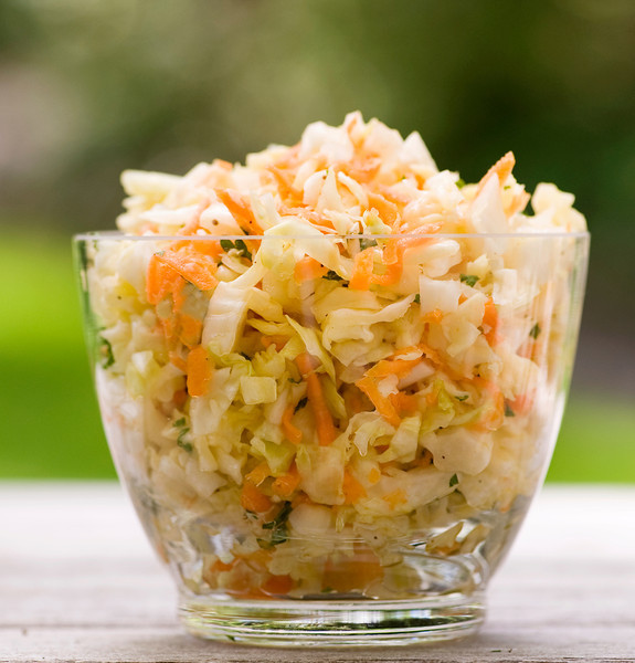sweet and tangy coleslaw Vinegar coleslaw in a dish.