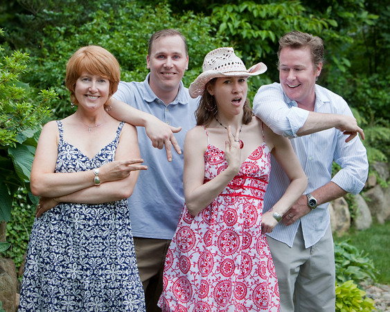 Brothers and sisters in a goofy picture.