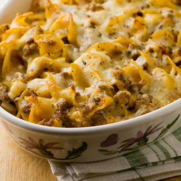 Beef stroganoff casserole on a dishcloth.