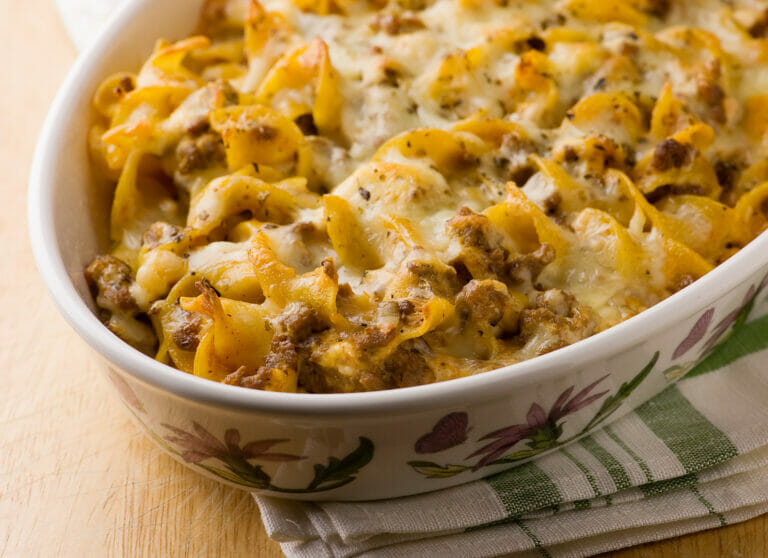 Beef stroganoff casserole on a dishcloth.
