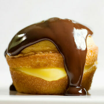 Boston Cream Pie Cupcake sitting on the counter.