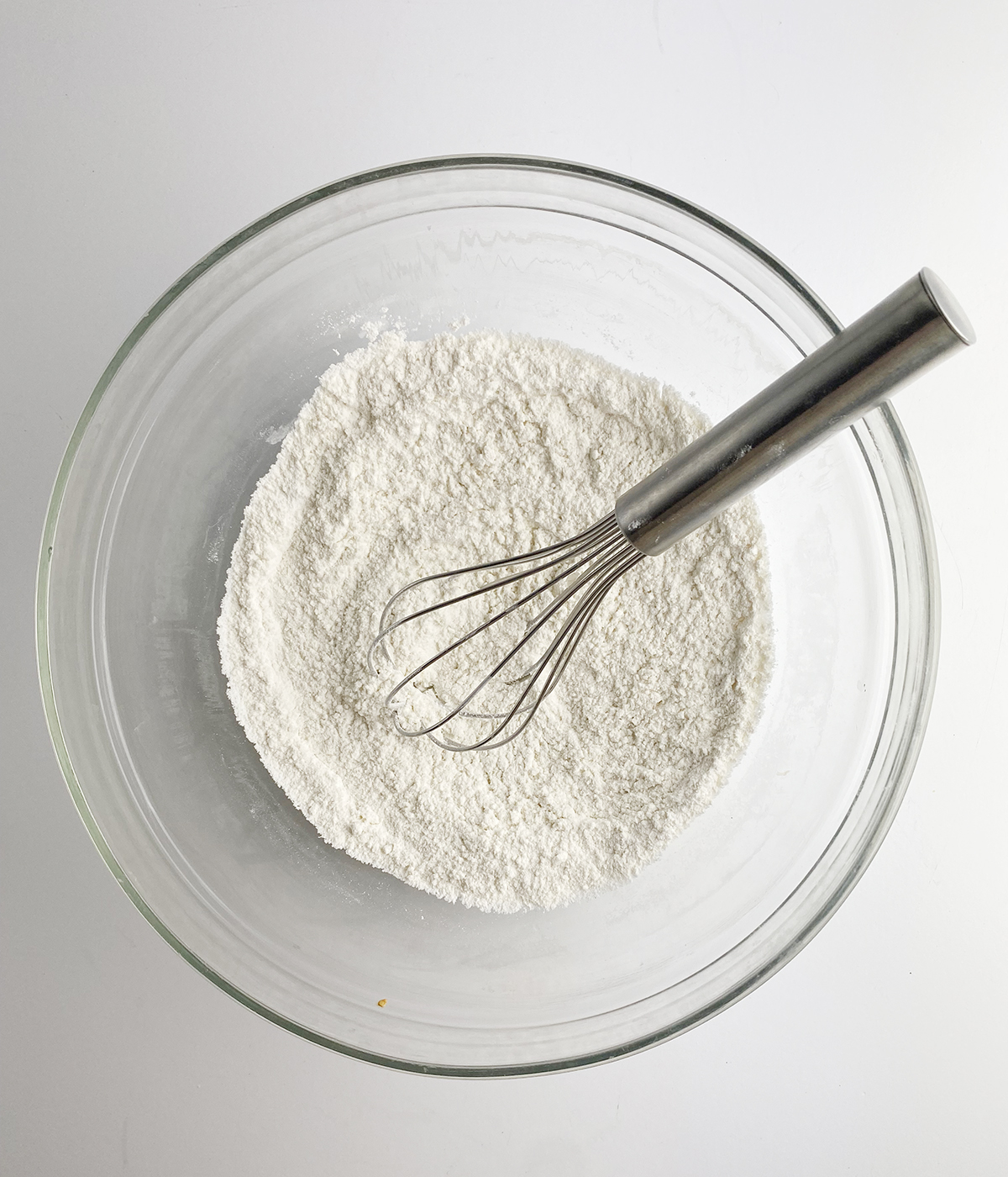 Flour and baking soda mixture in a bowl.