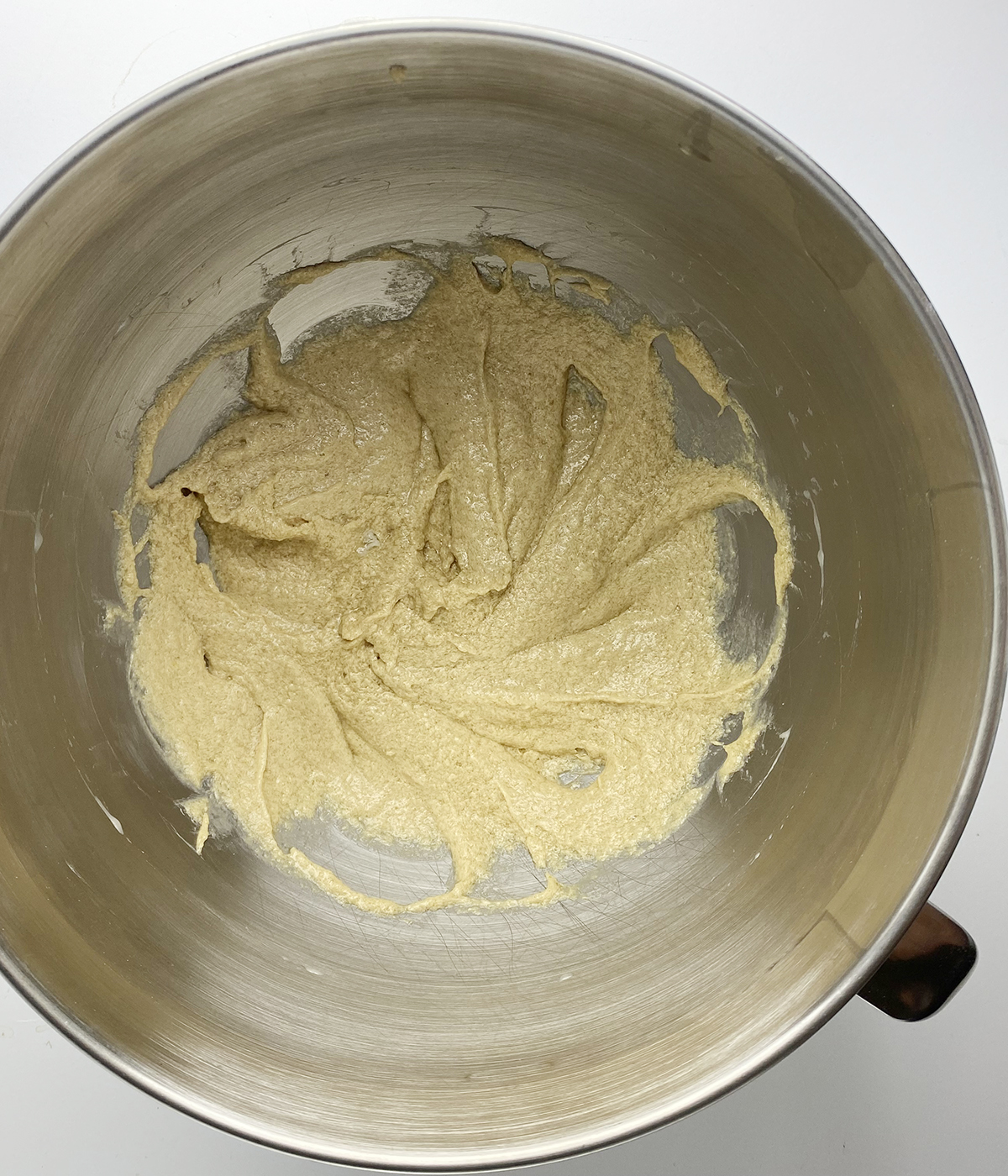 Creamed butter and brown sugar in mixing bowl.