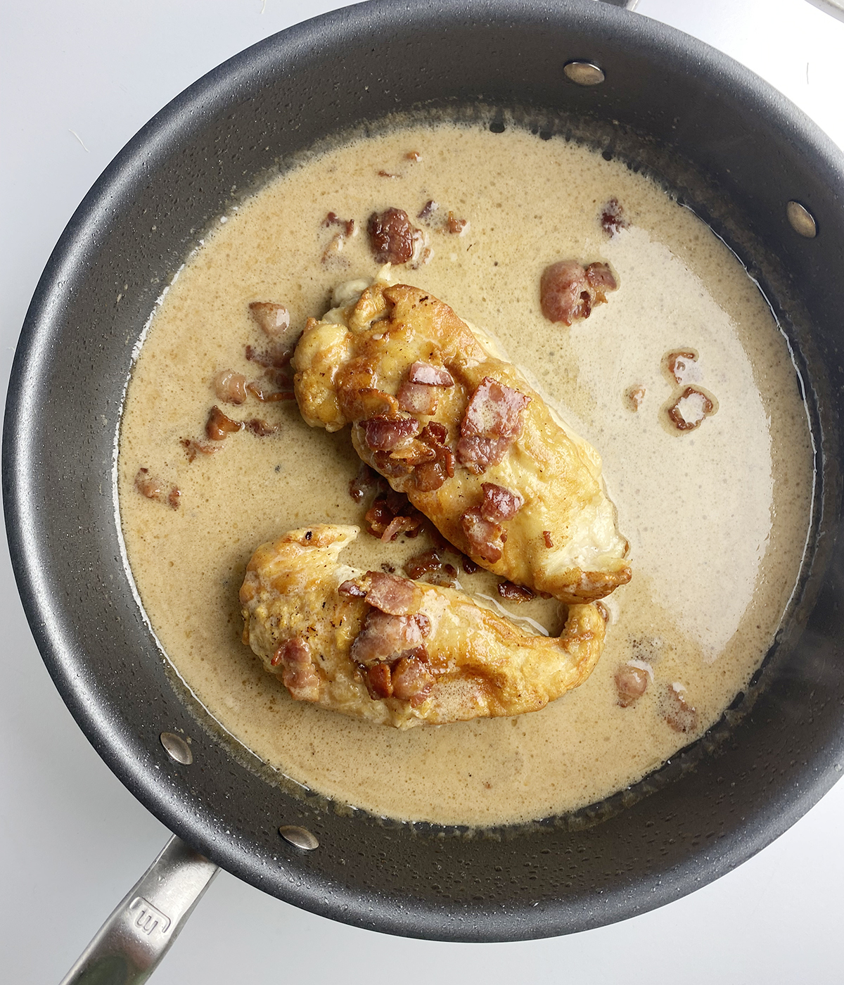 Creamy chicken marsala in a skillet.