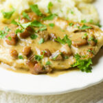 Creamy chicken marsala on a plate.