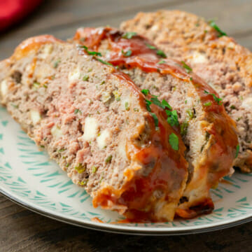 Ricotta meatloaf slices on a plate.