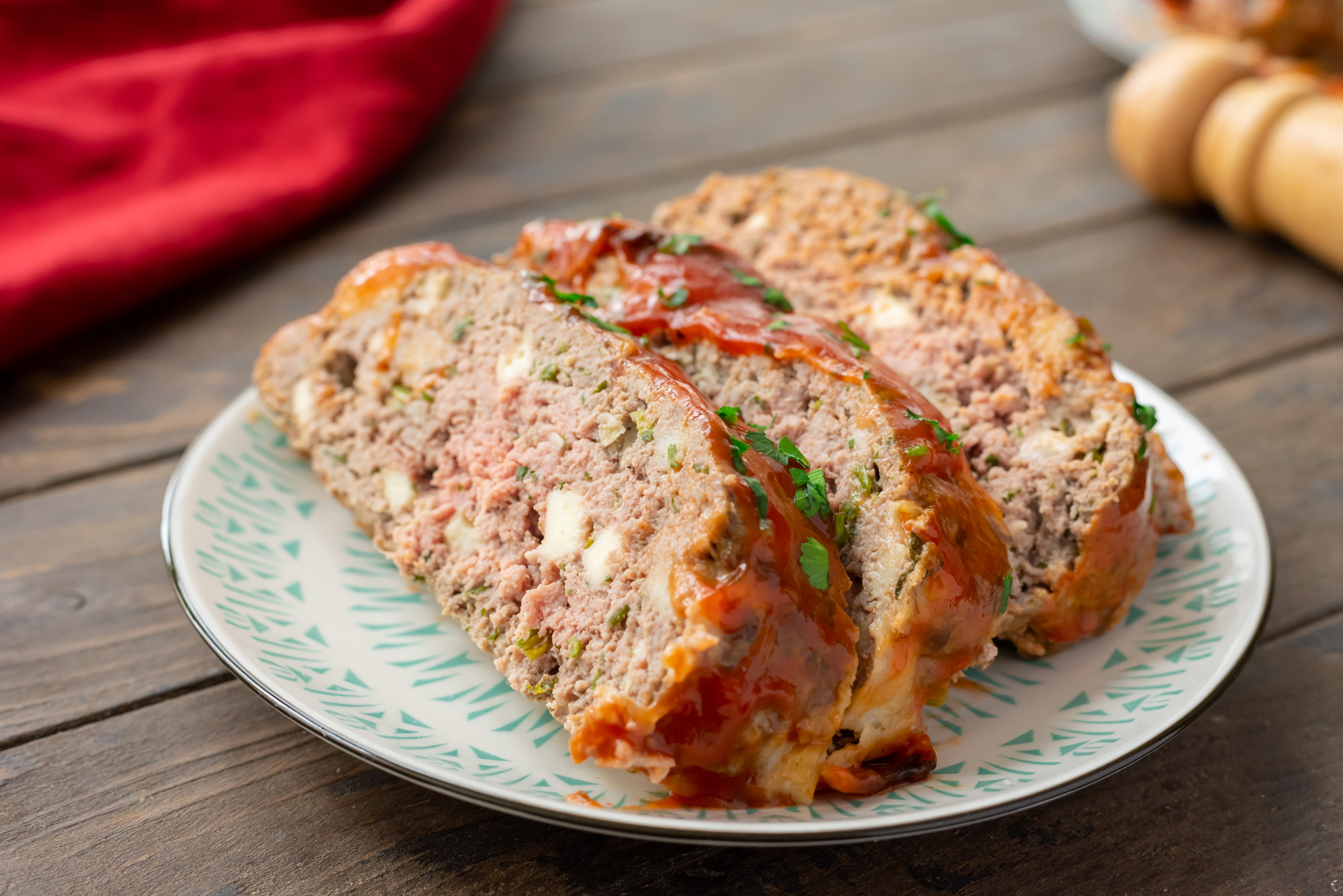 Ricotta meatloaf slices on a plate.