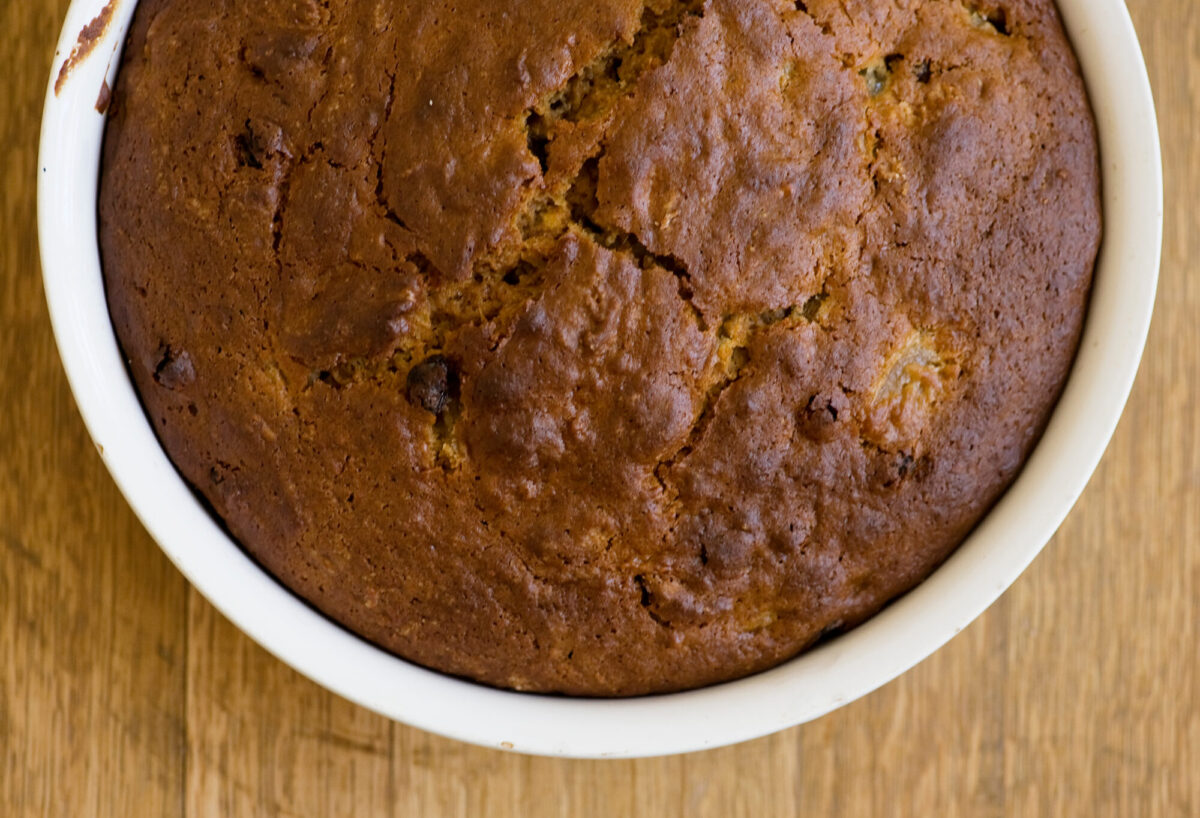 Apple cake baked and cooling in the pan.