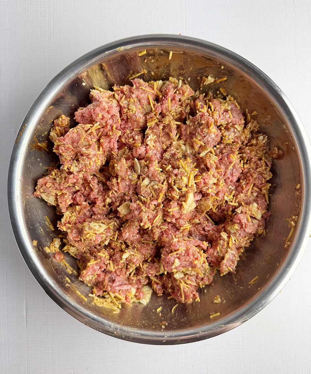 Taco meatloaf mixture in a bowl.