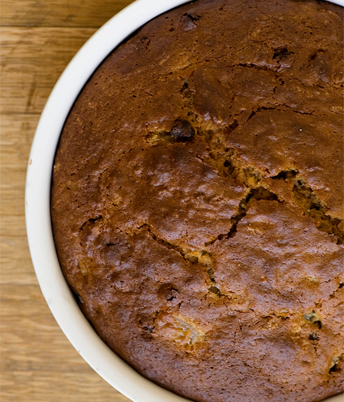 Baked apple cake cooling in the baking dish.
