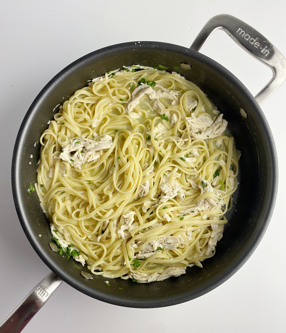 Lemon chicken pasta in a skillet.