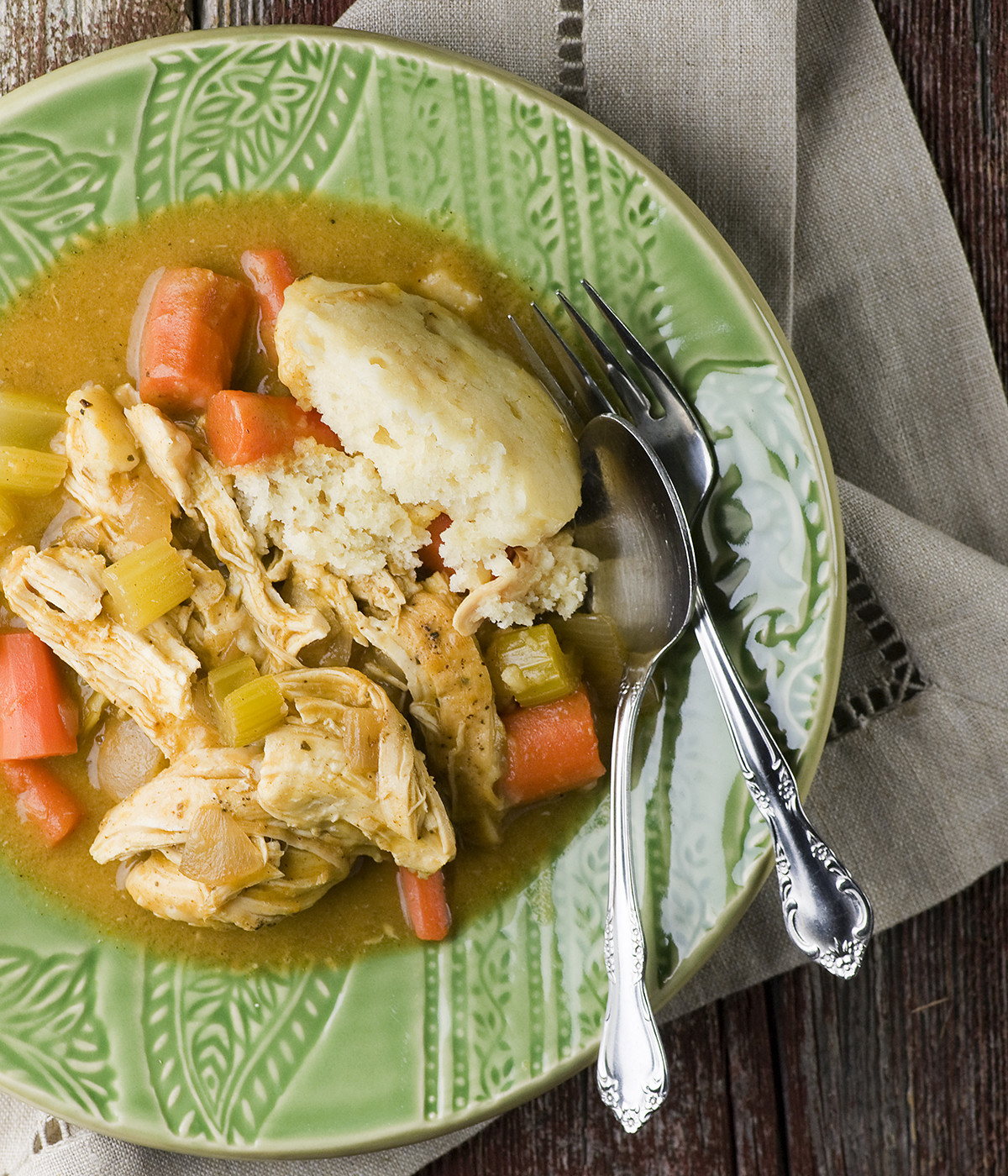 Plate full of chicken and dumplings.