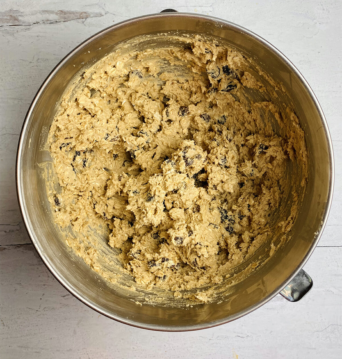 Rum raisin cookie dough batter in a mixing bowl.