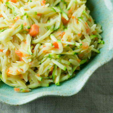 Easy cheddar vegetable orzo in a bowl.