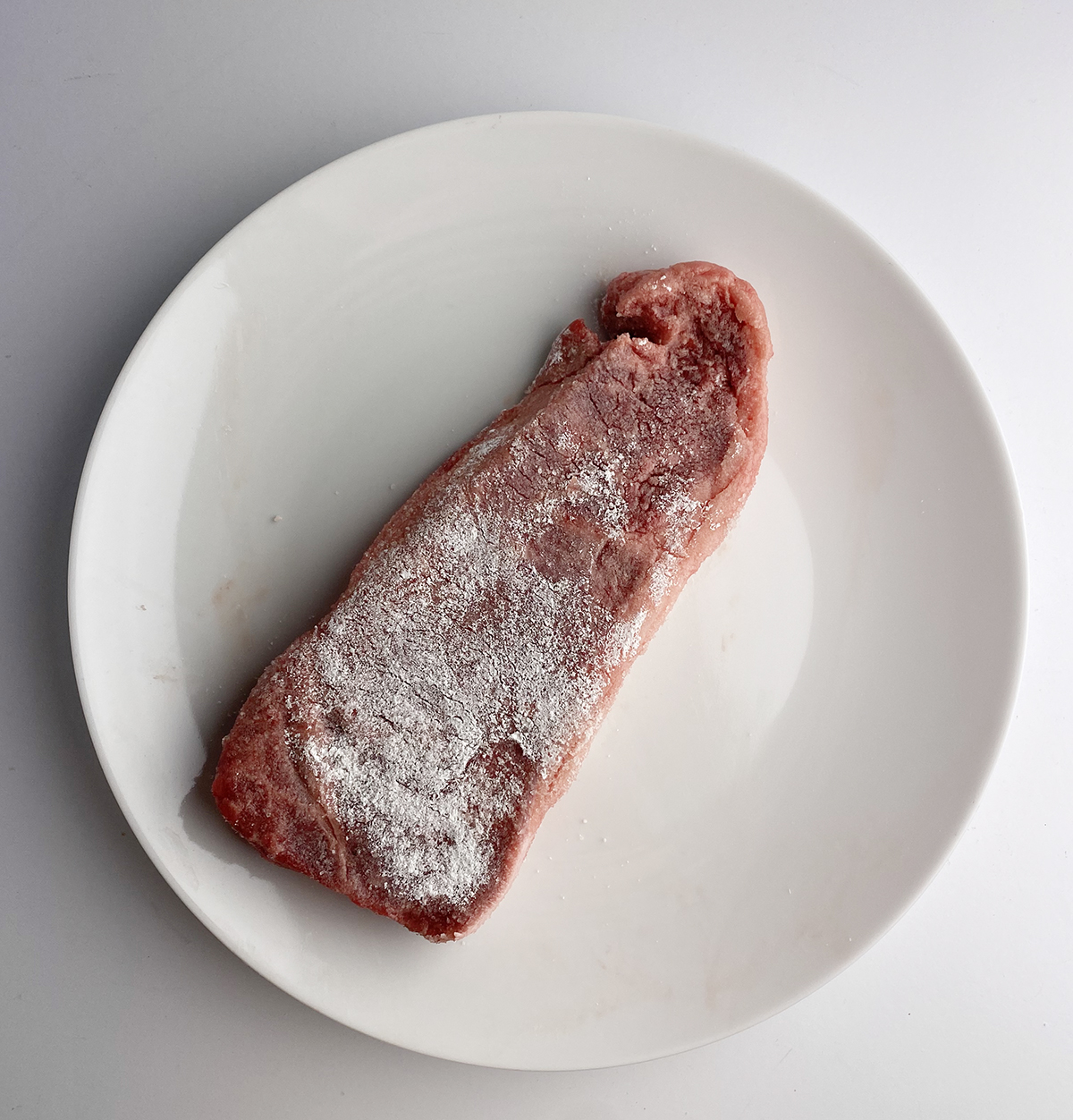 steak covered with cornstarch mixture