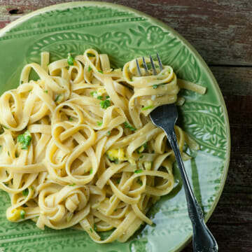 Pasta with Buttered Egg Sauce on a plate with a fork.