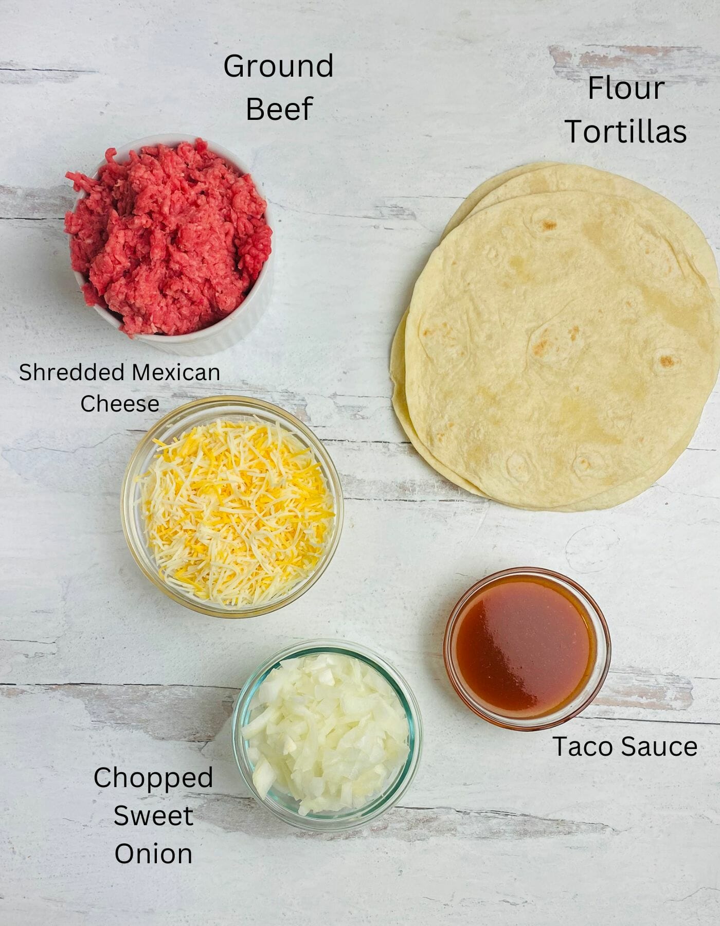 Taco Wrap Ingredients on a wooden counter.