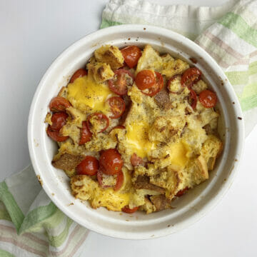 Grilled cheese bake casserole on a dishcloth.