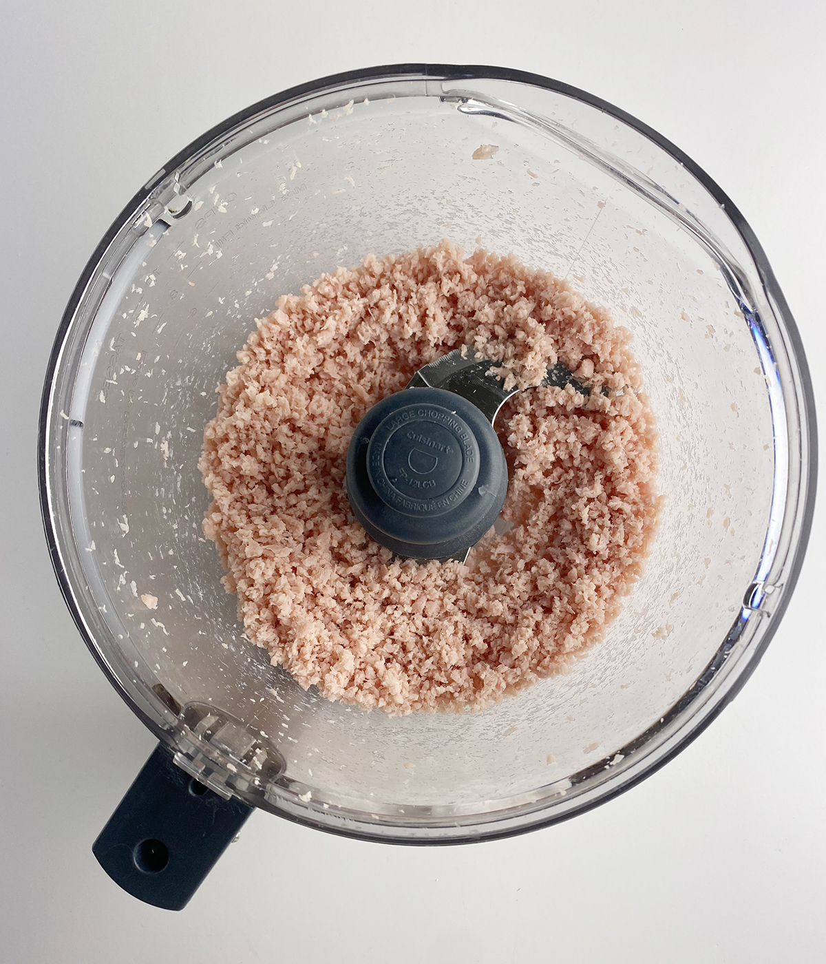 Chopped ham in a food processor