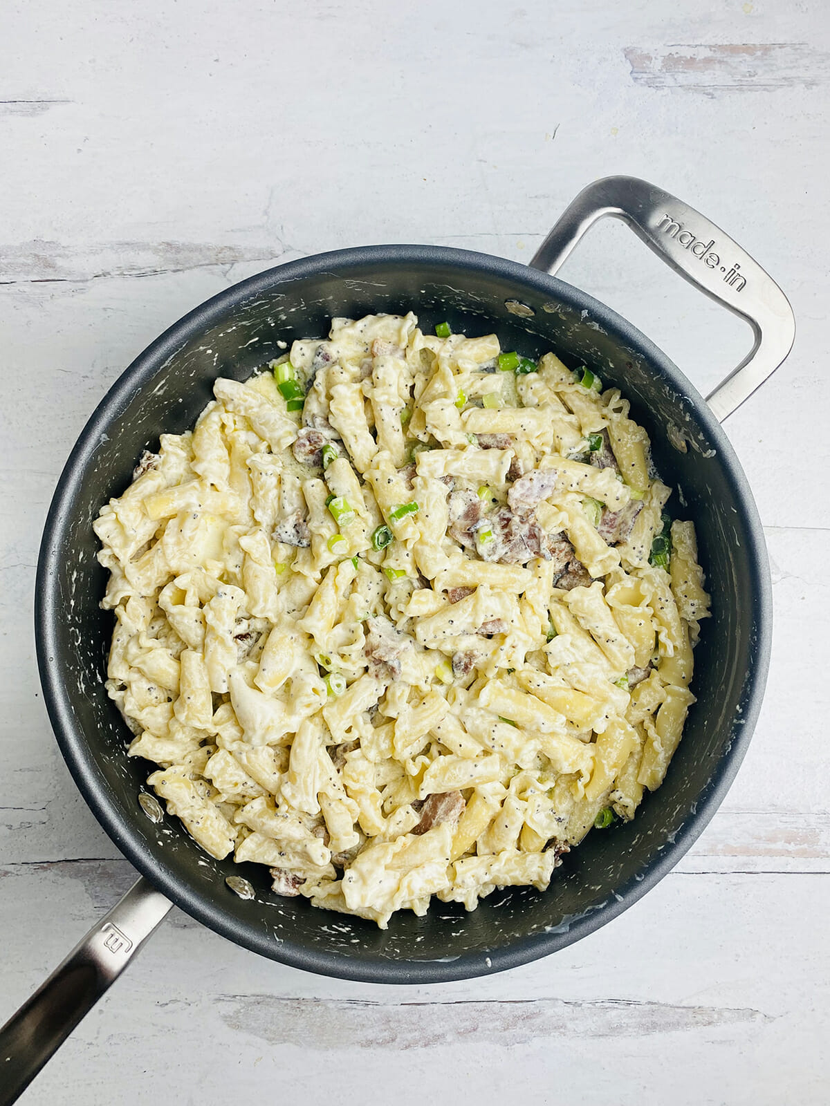 Sour cream pasta ready to serve out of the pot.