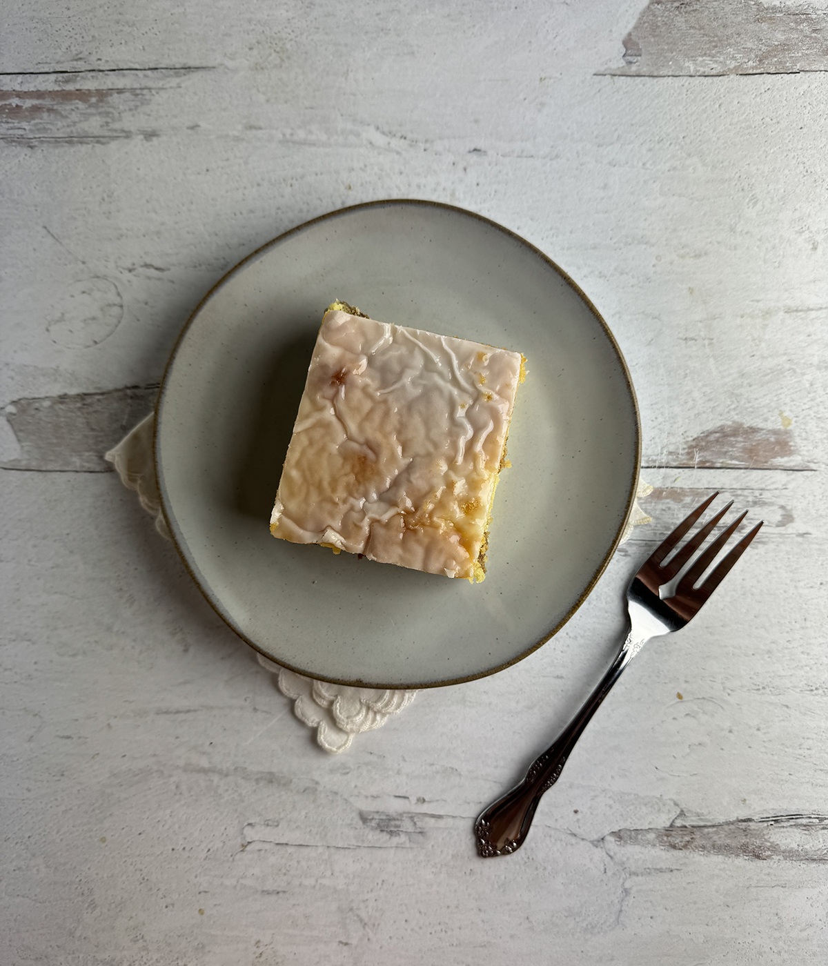 Slice of honeybun cake on a plate.