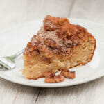 Slice of skillet banana walnut bread on a plate.