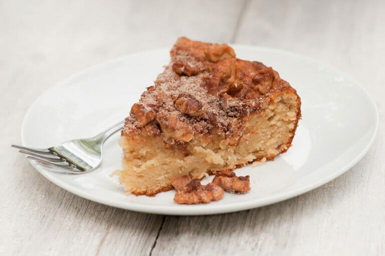 Slice of skillet banana walnut bread on a plate.