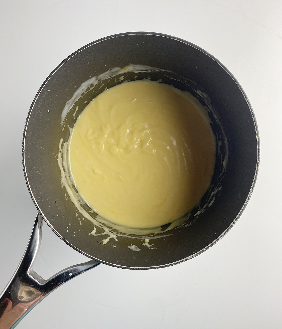 Cheese sauce in a pot.