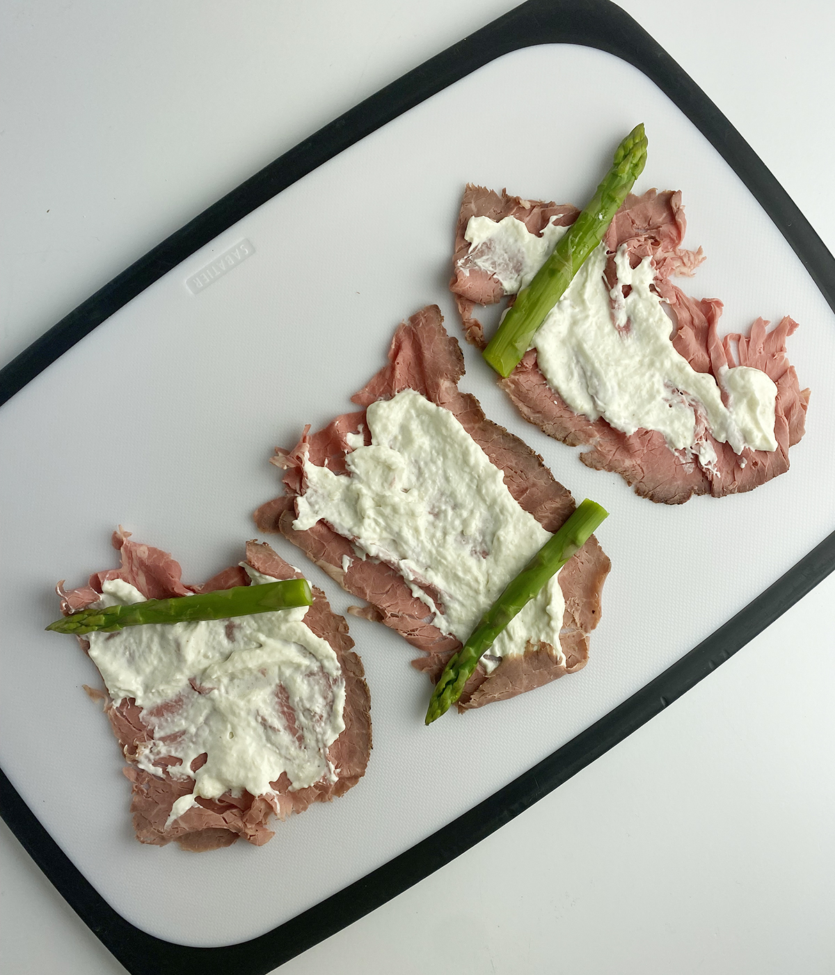 Beef roll-ups ready to be rolled.