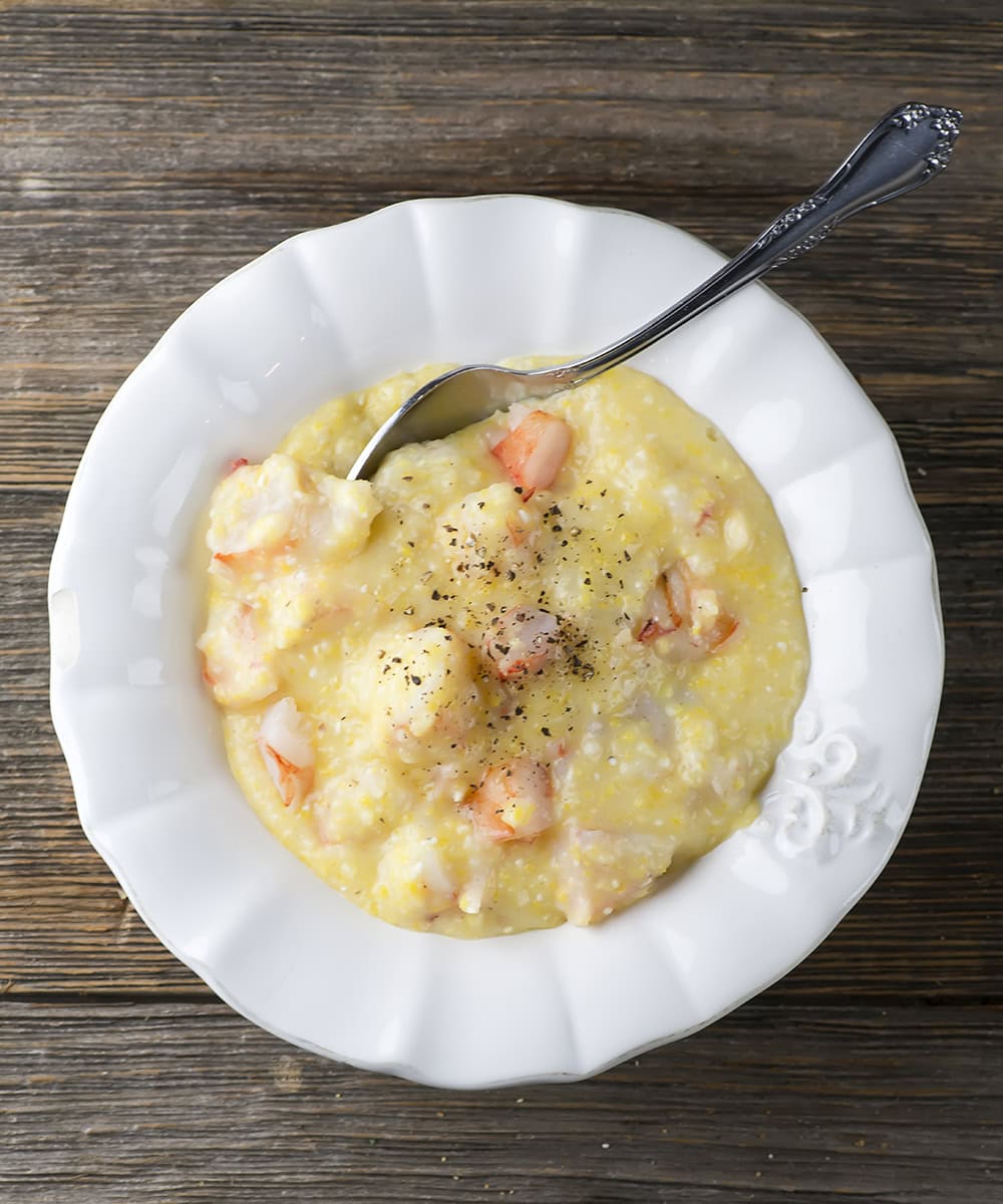 Bowl of chopped shrimp and grits.