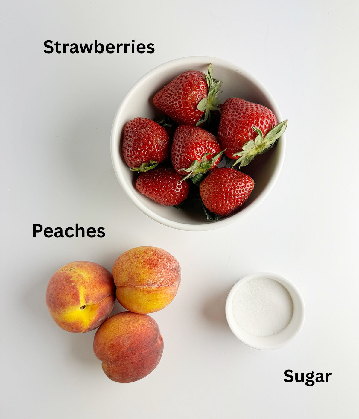 Ingredients needed for strawberry peach sorbet.