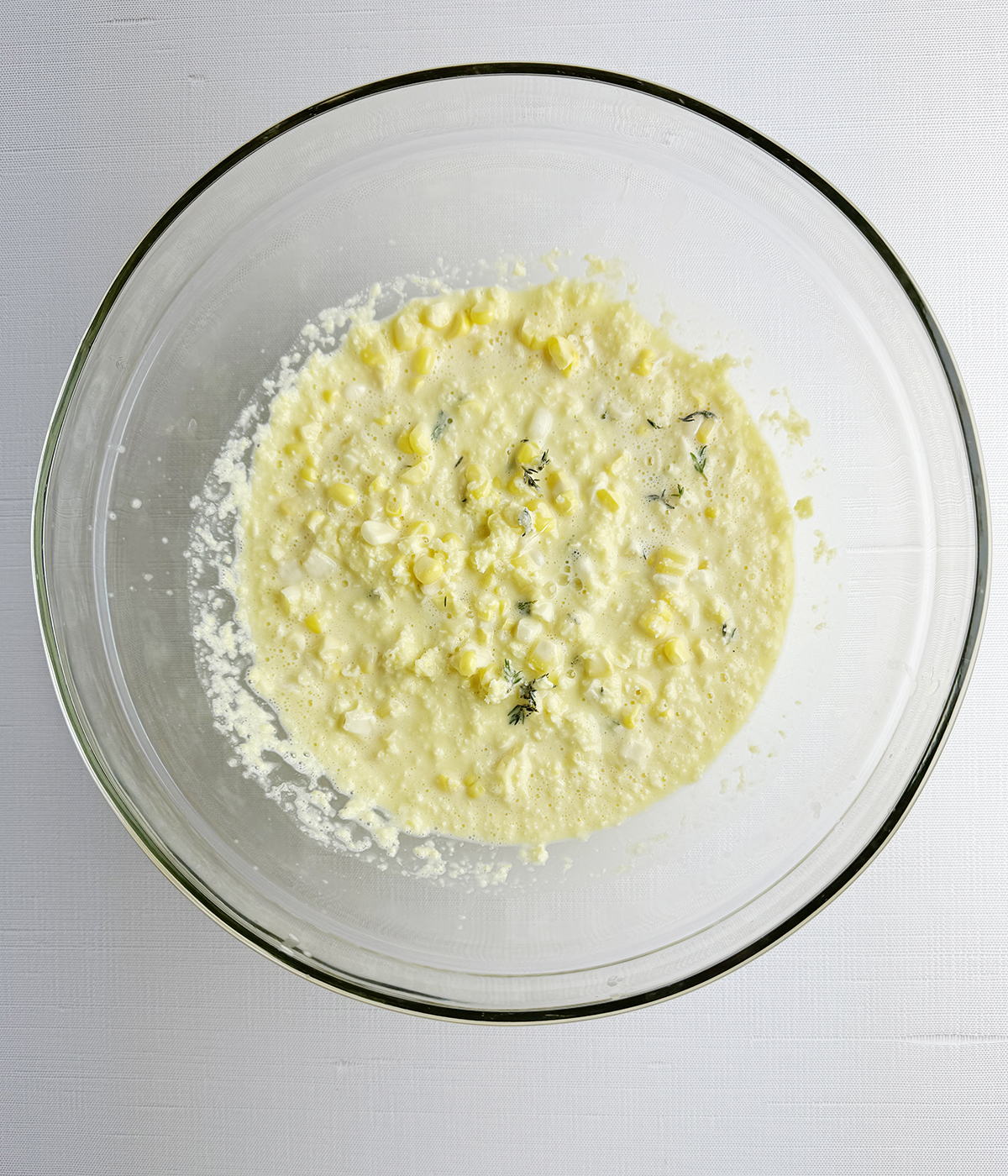 Pureed corn and cream mixture in a mixing bowl.