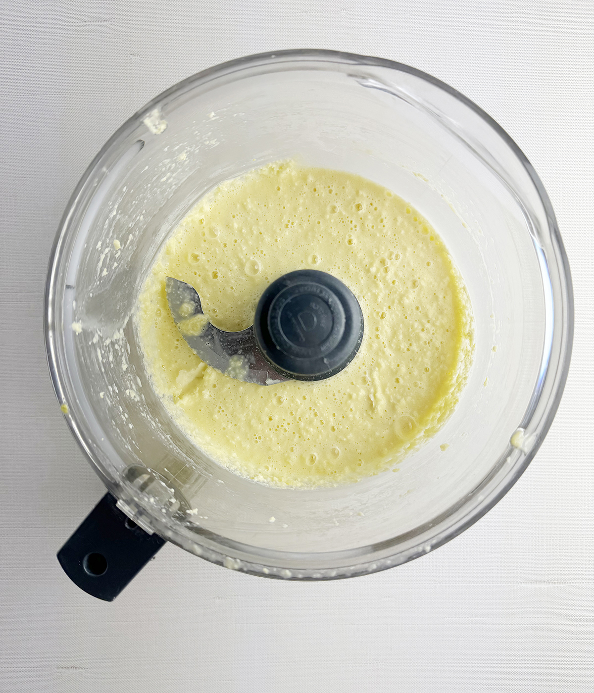 Pureed corn in a food processor.