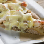 Grilled Lobster Brie Sandwishes on a platter.